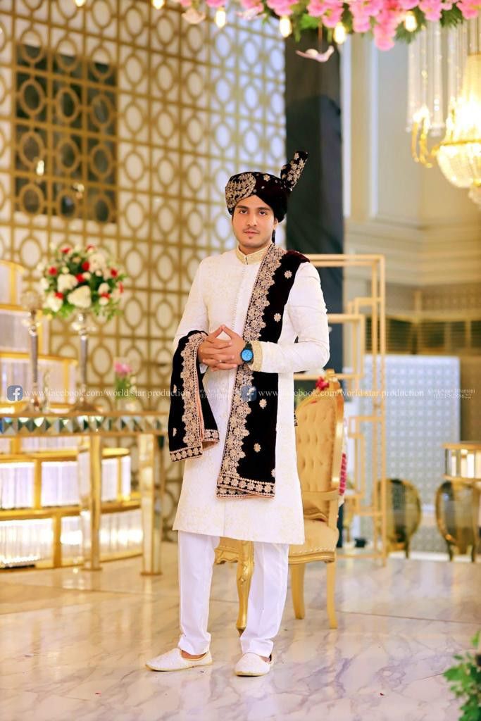 Groom portrait at reception